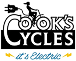 A black and white picture of the logo for cook 's cycles.